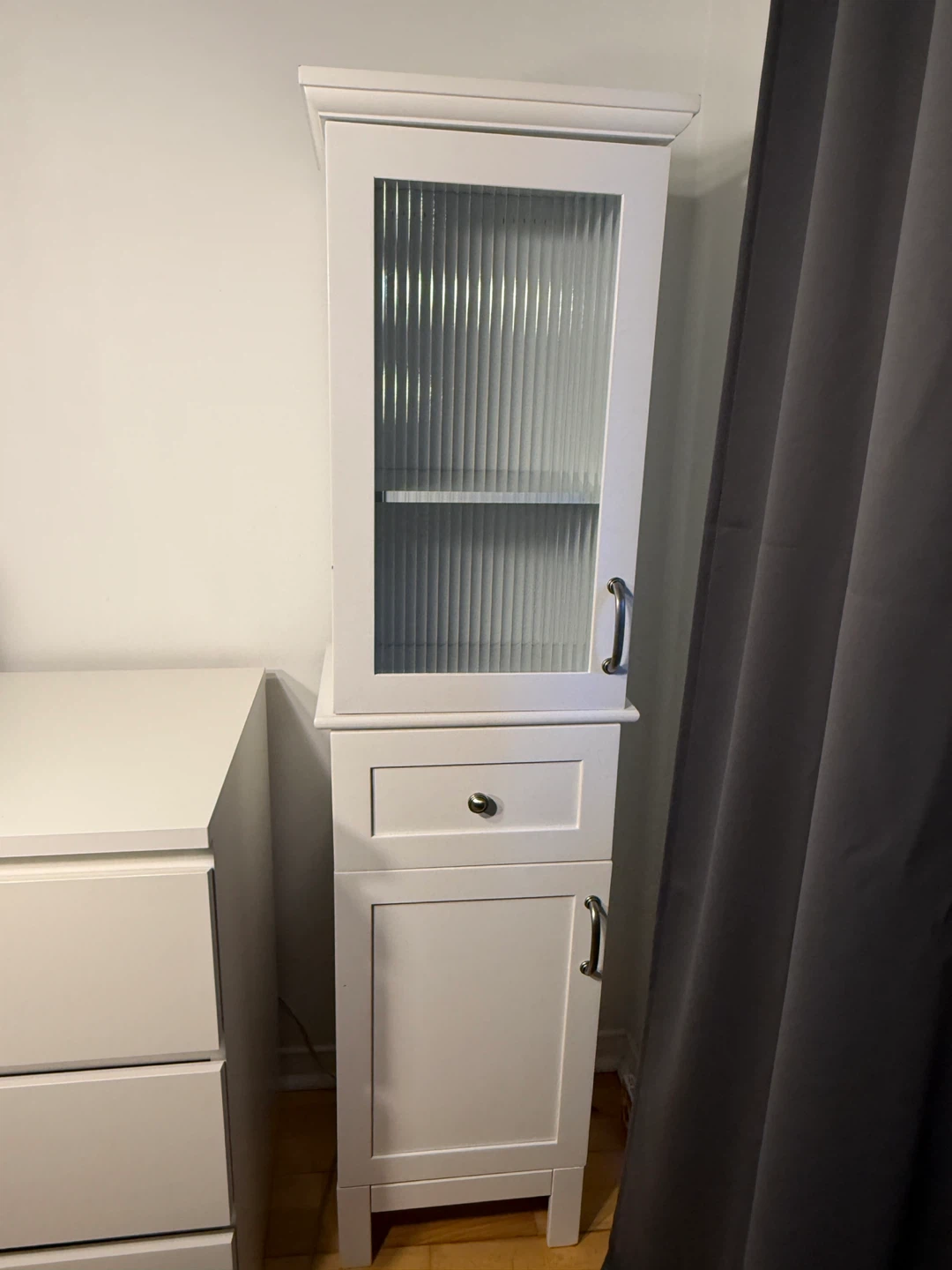 White tall storage cabinet