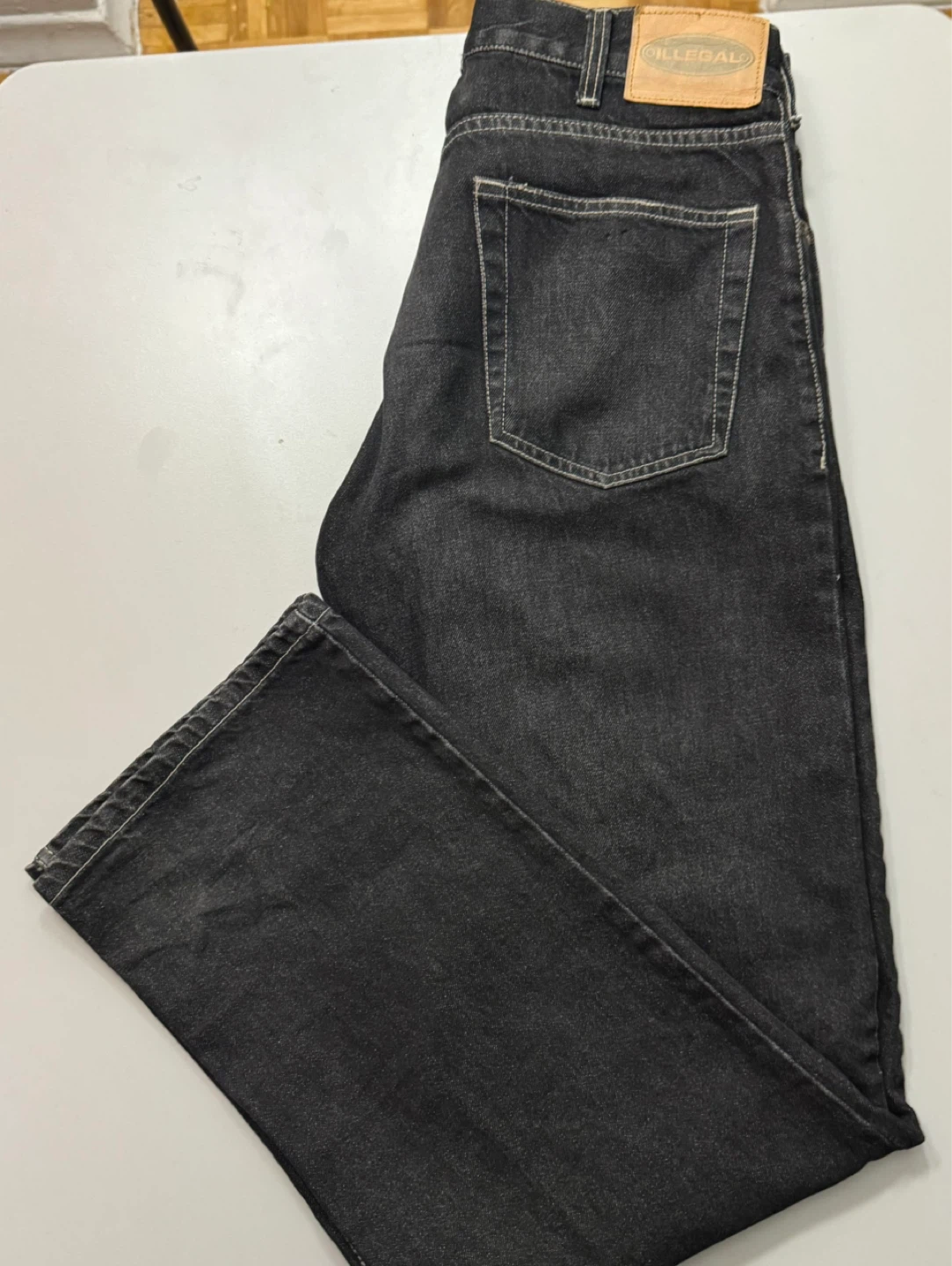 Illegal black denim jeans