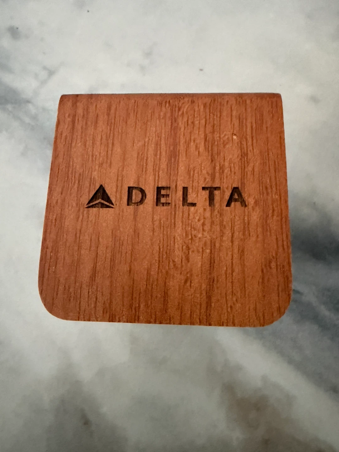 Delta branded wooden bluetooth speaker