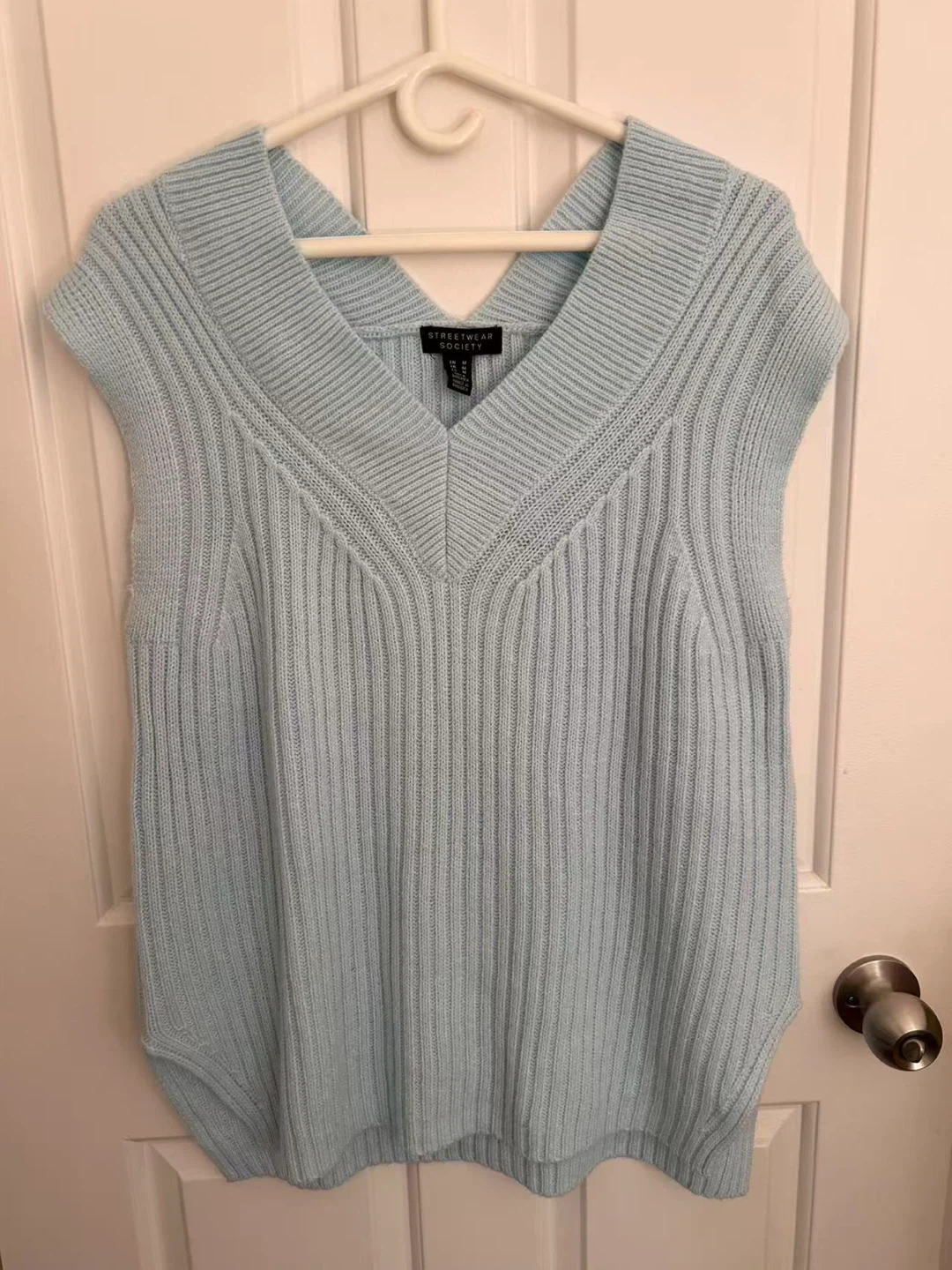 light blue sweater vest