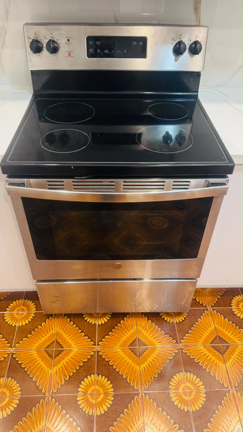 GE Stainless Steel Electric Range - photo 4