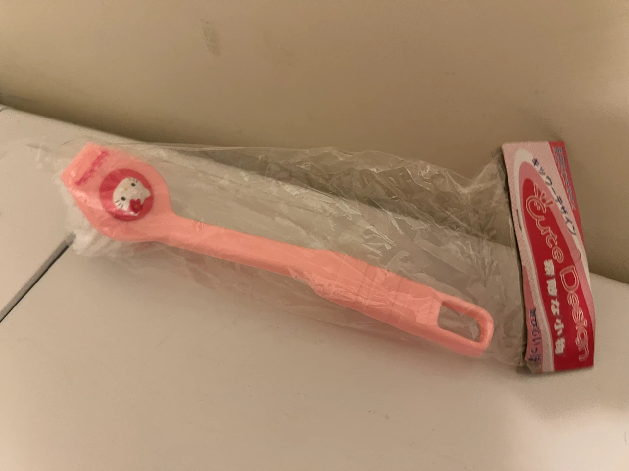 Hello Kitty cleaning brush