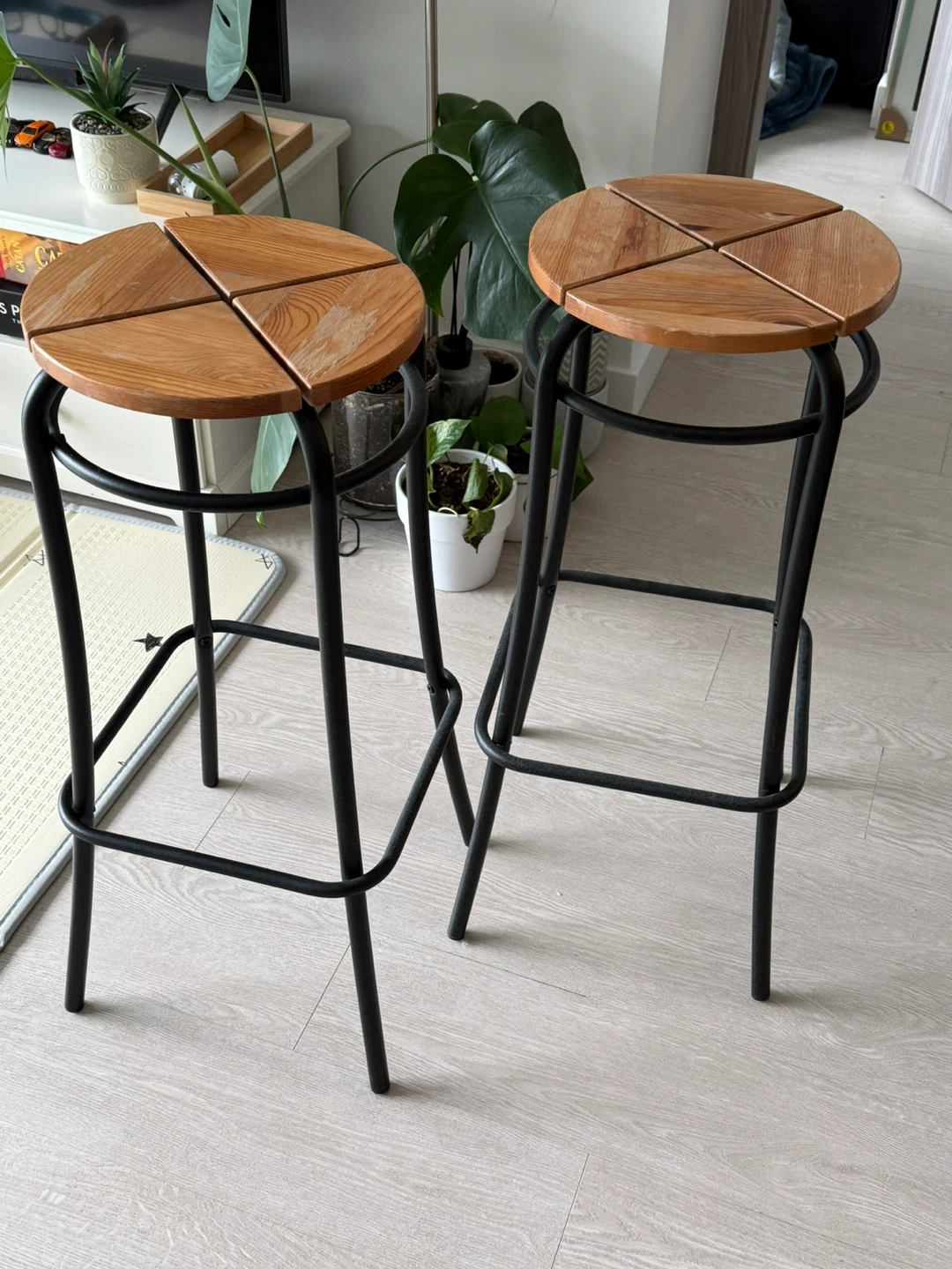 Two wooden bar stools