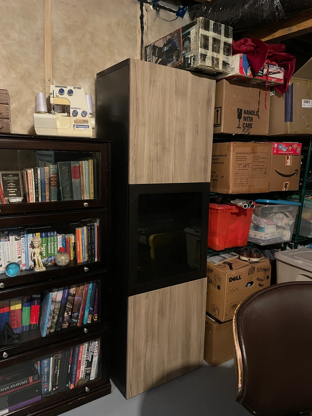 Tall Storage Cabinet with Woodgrain and Black Finish