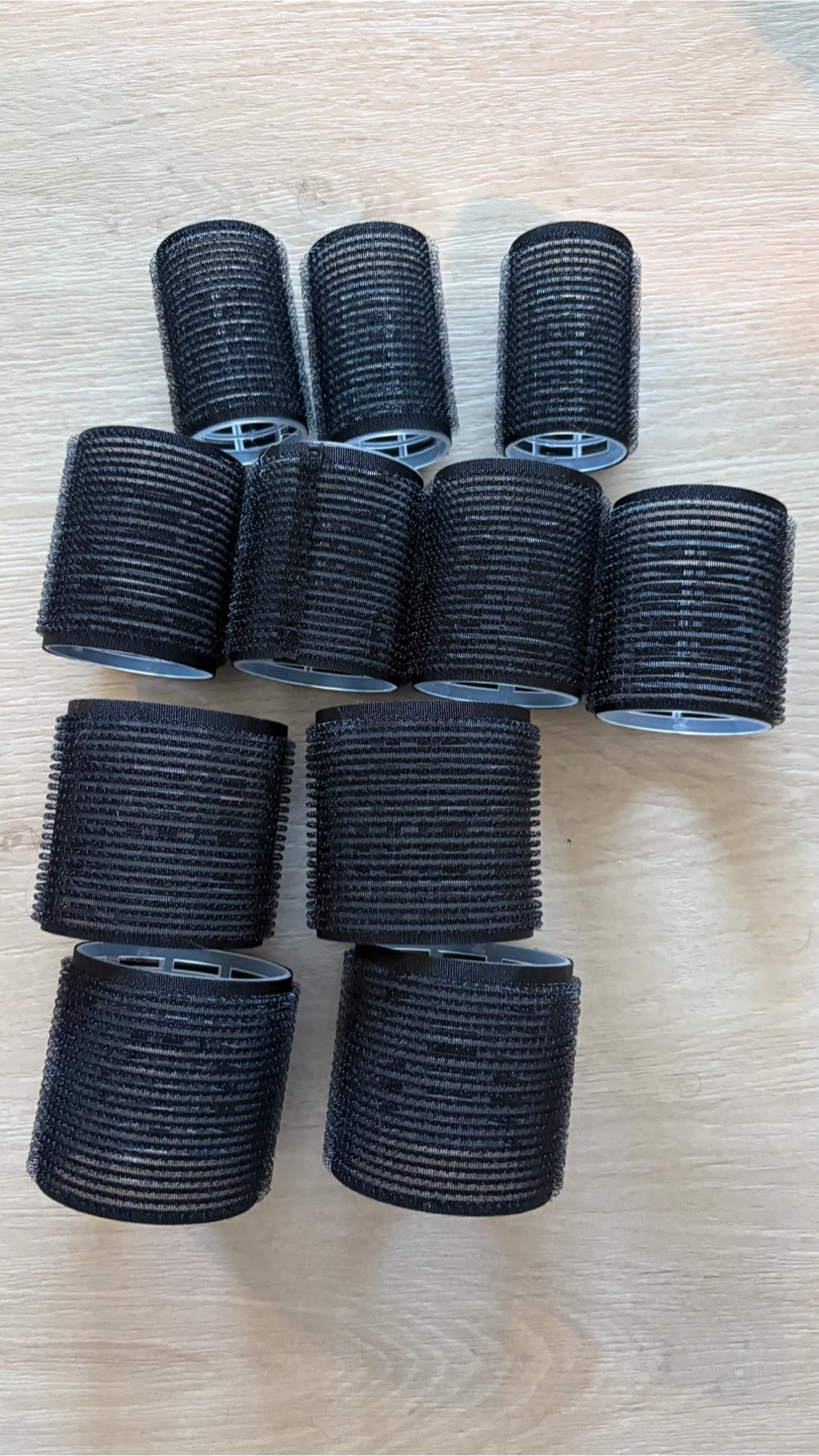 Hair rollers with metal styling clips