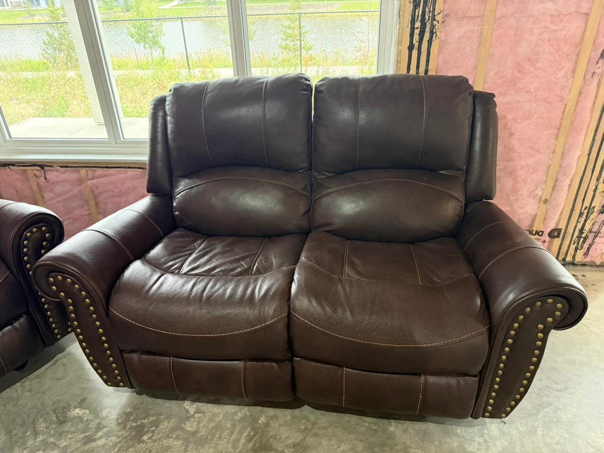 Three-Piece Brown Leather Reclining Sofa Set