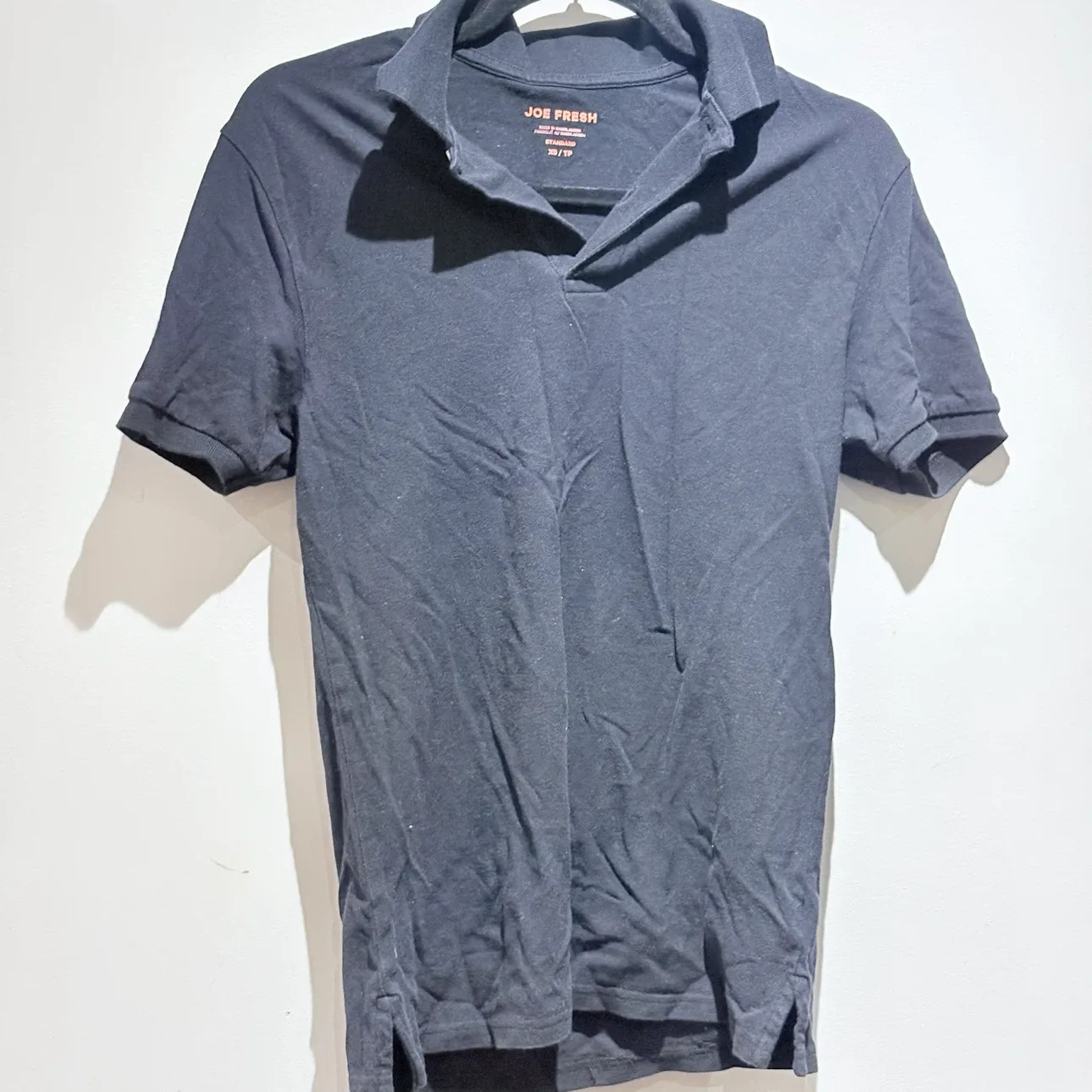 Joe Fresh black polo shirt