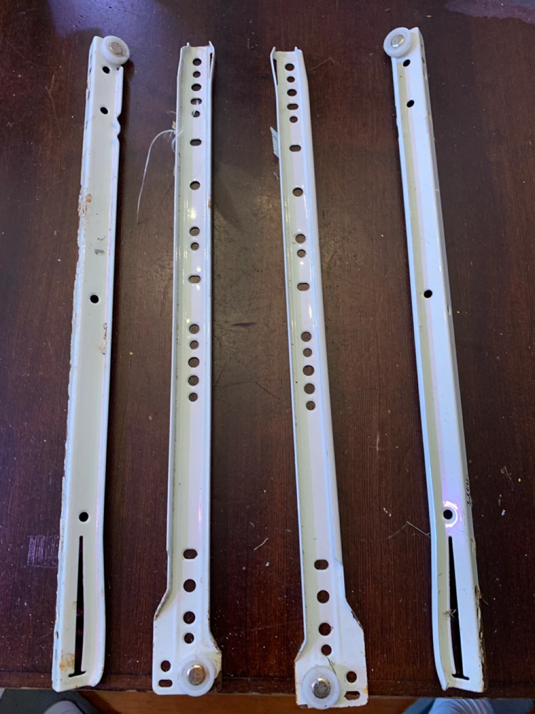 Set of 4 White Metal Drawer Slides.