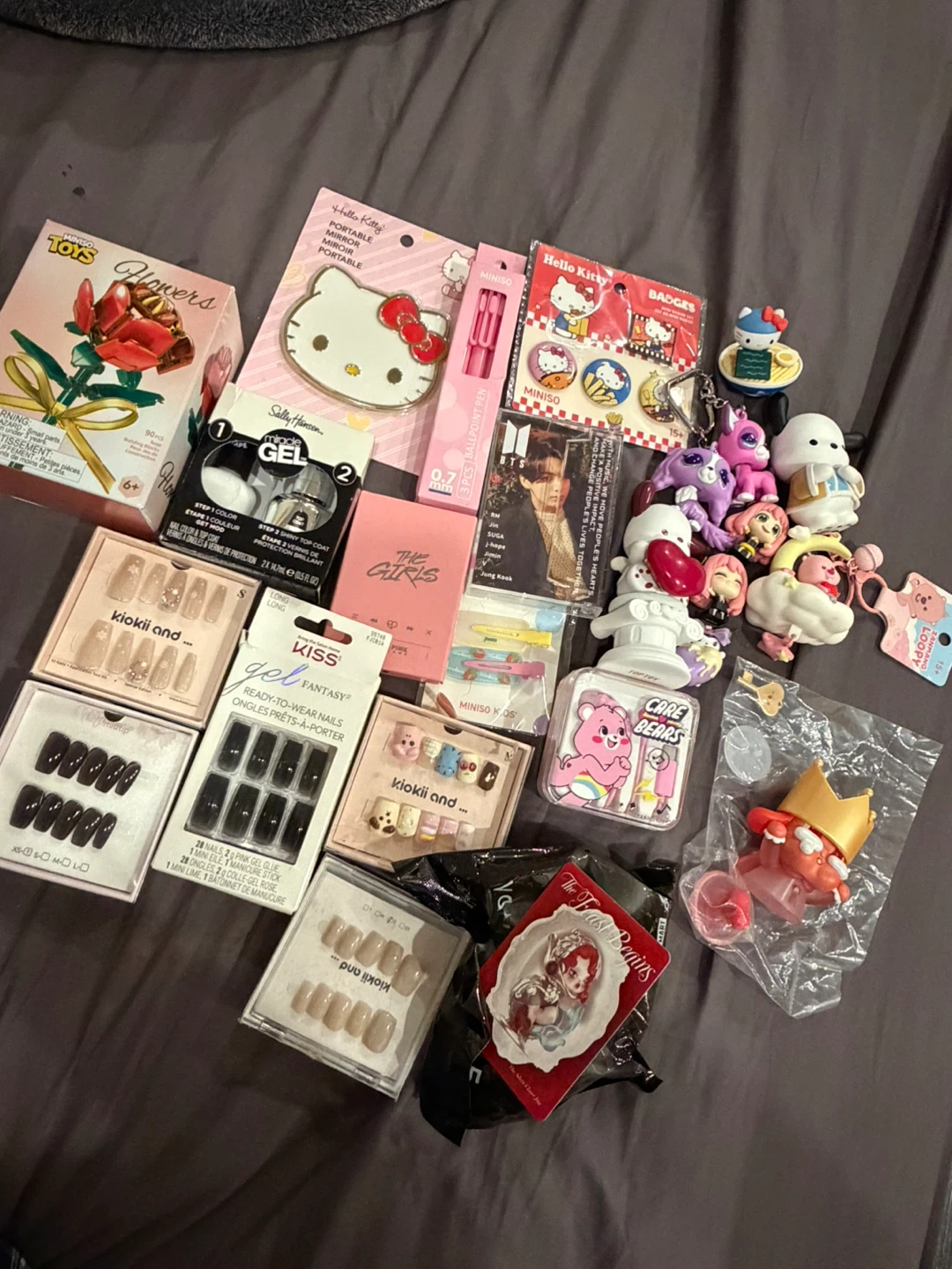 bundle of press on nails figures sanrio etc