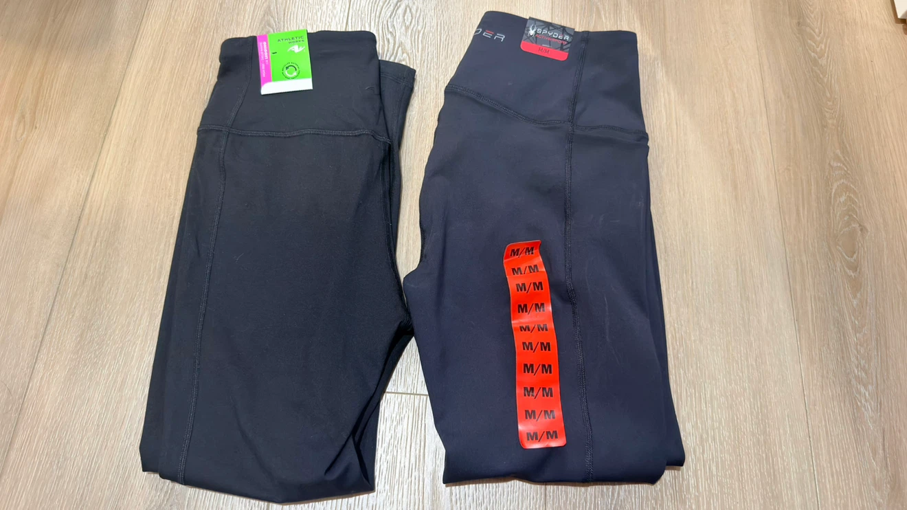 Two pairs of black leggings size Medium