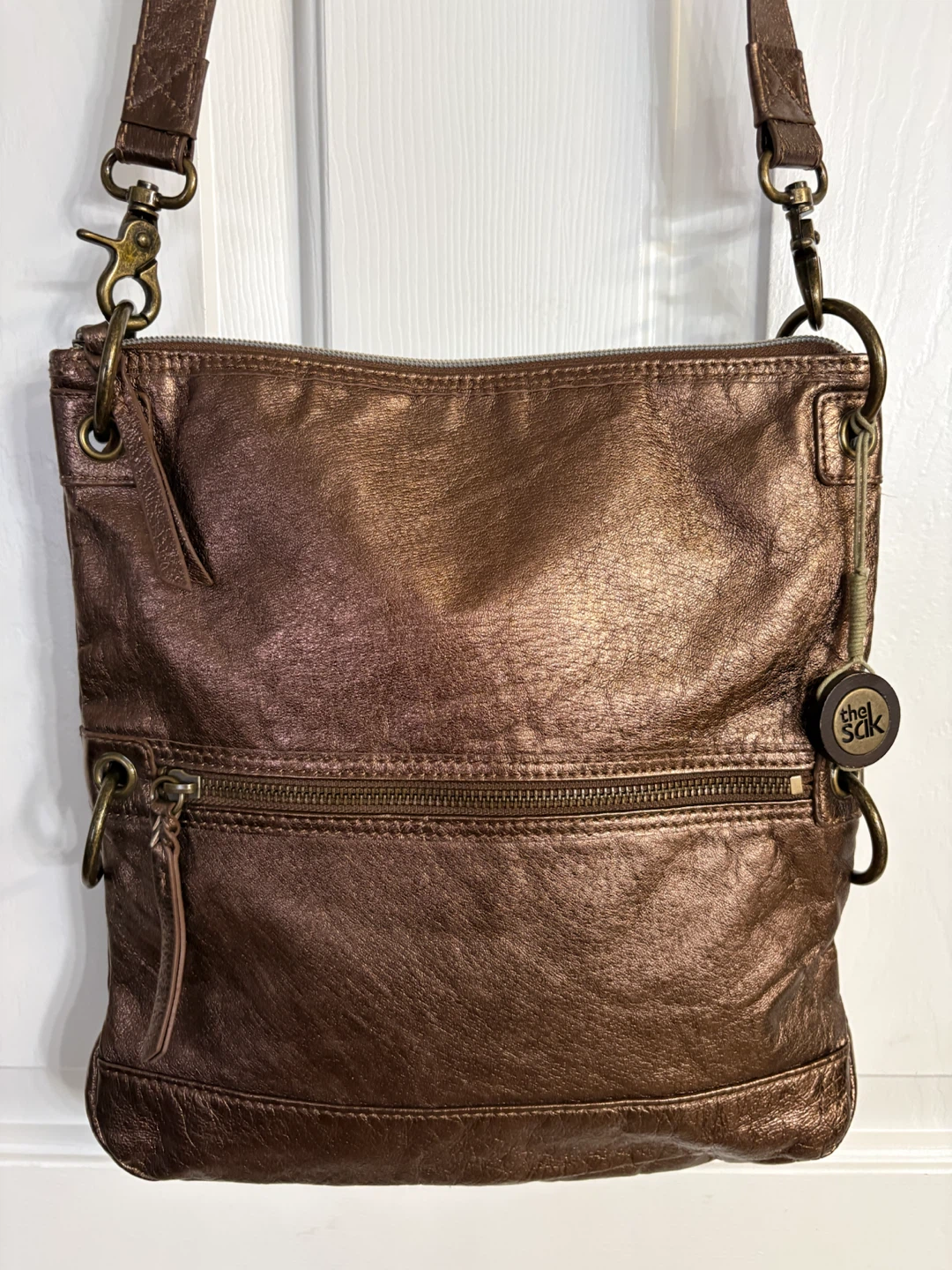 The Sak “Iris” Bronze Metallic Leather Crossbody Bag
