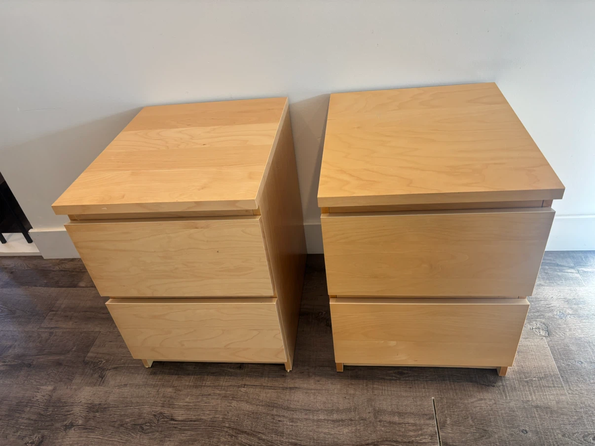 pair of IKEA nightstands in oak colour