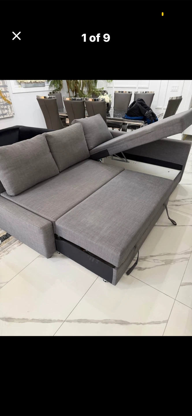 Grey sectional sofa with pull-out bed