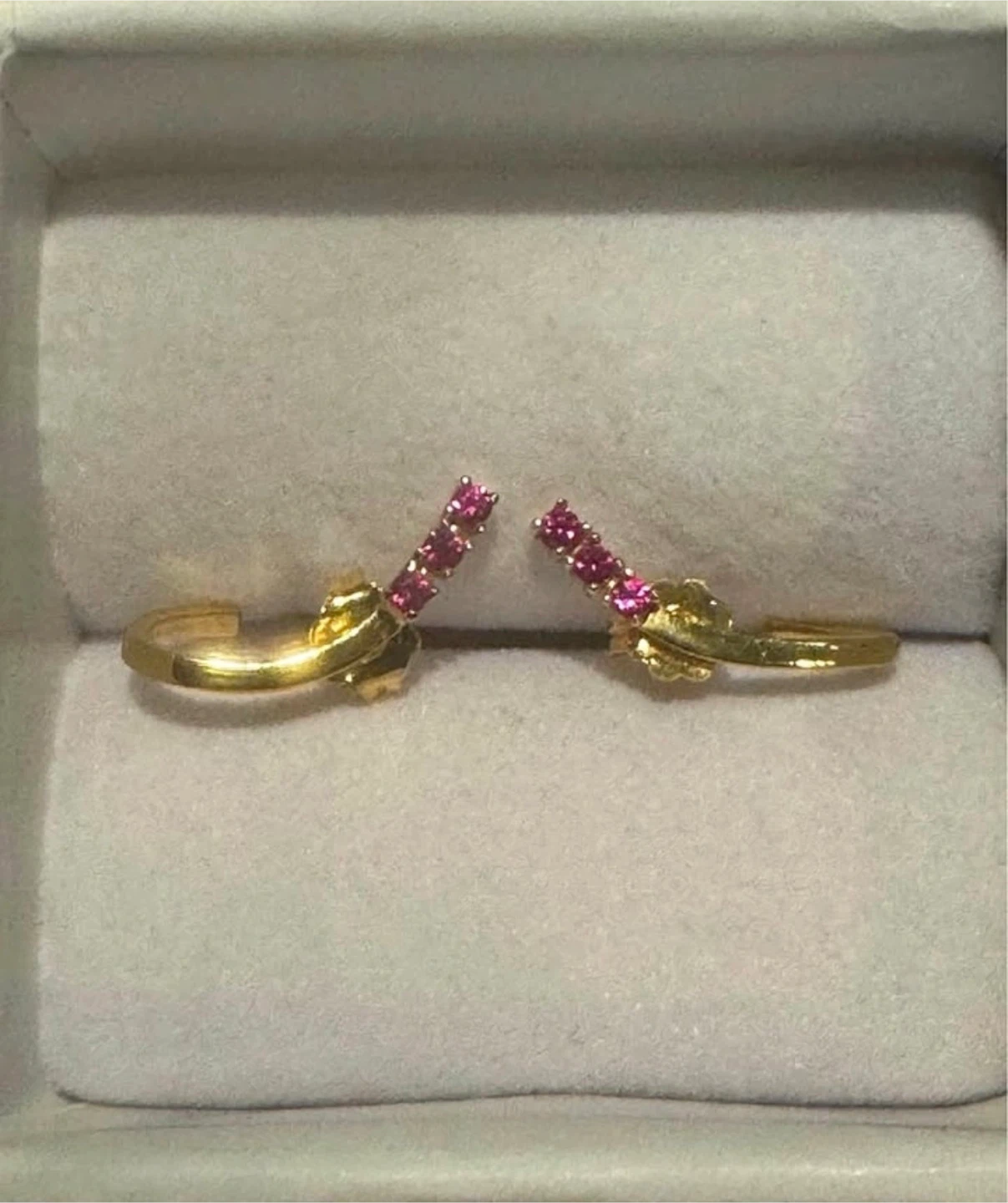 Gold plated silver earrings with red gemstones