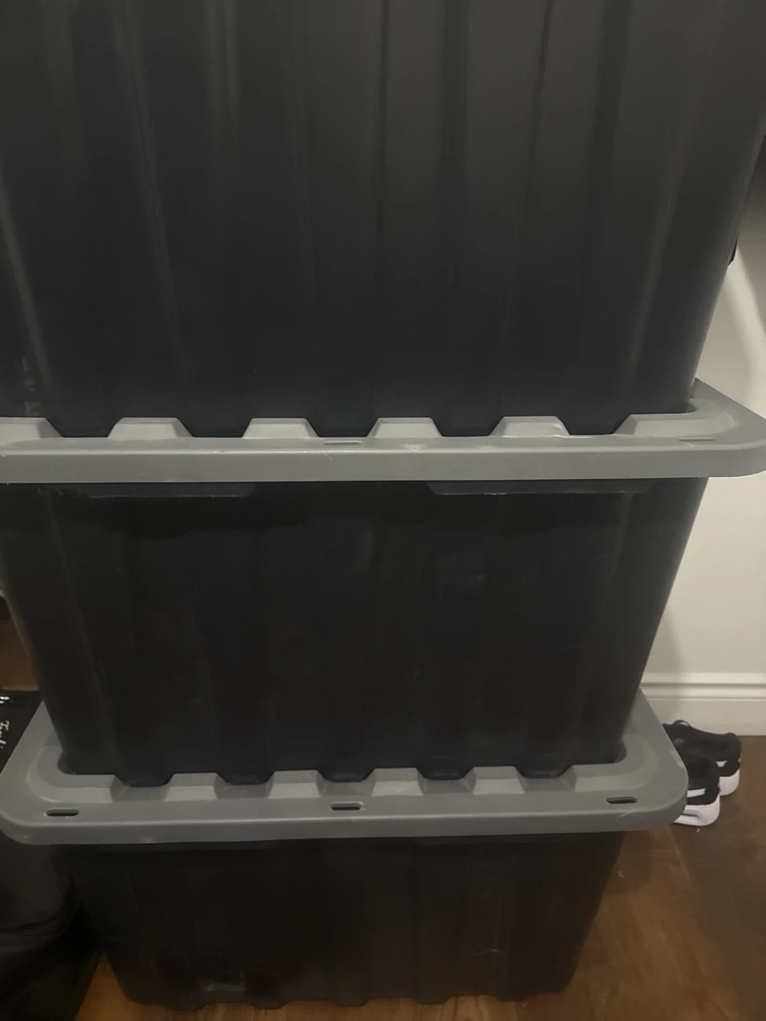 Four Black Storage Totes