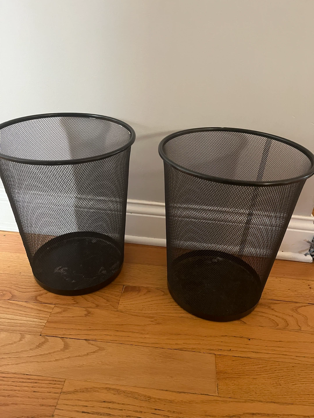 Two Black Mesh Waste Baskets