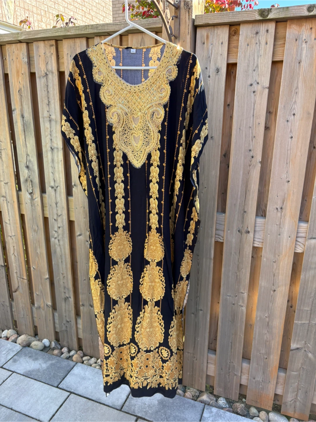 Black and gold kaftan dress with sequins