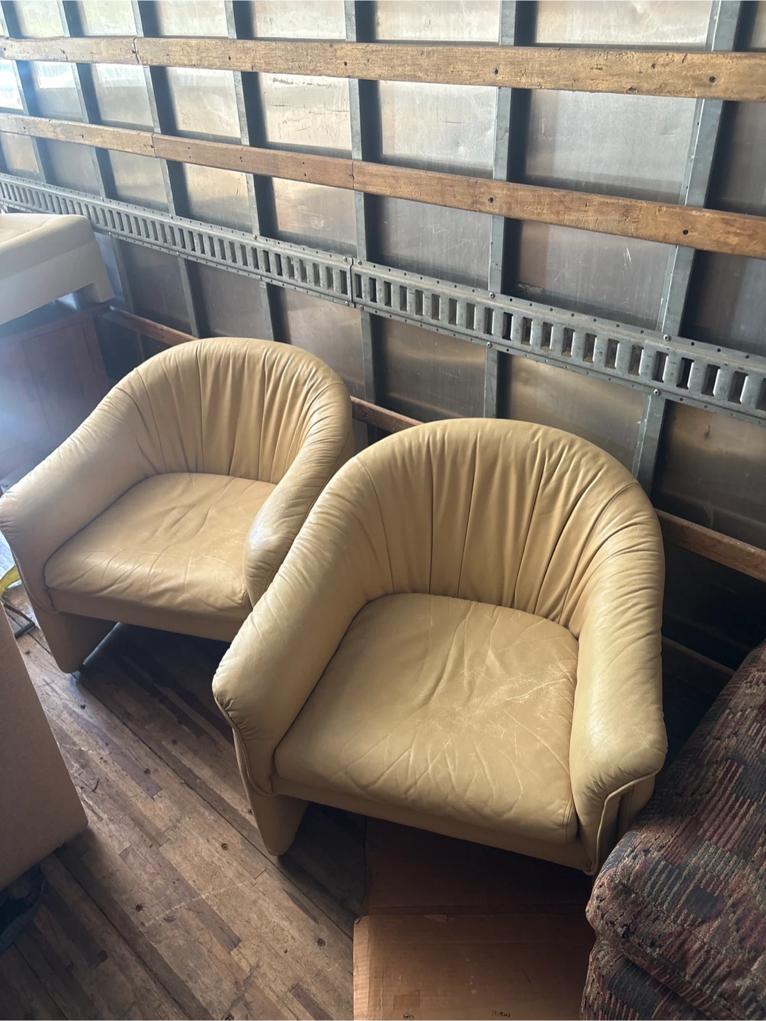 Set of two vintage tan leather club chairs