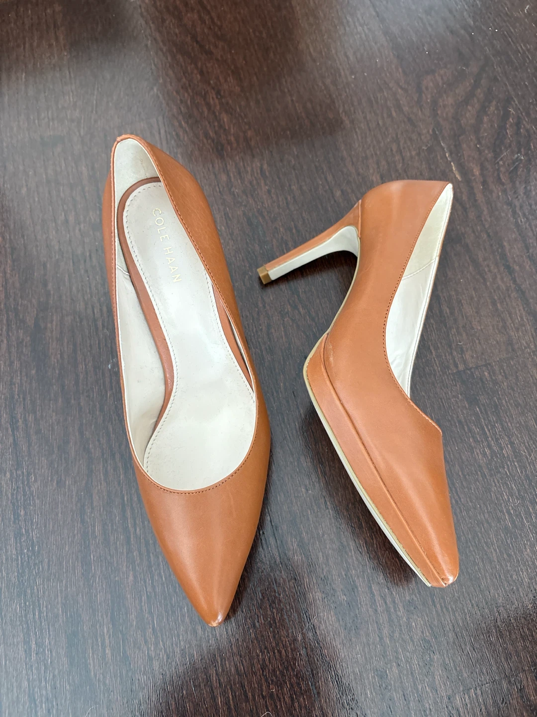 Ladies Cole Haan tan shoes.