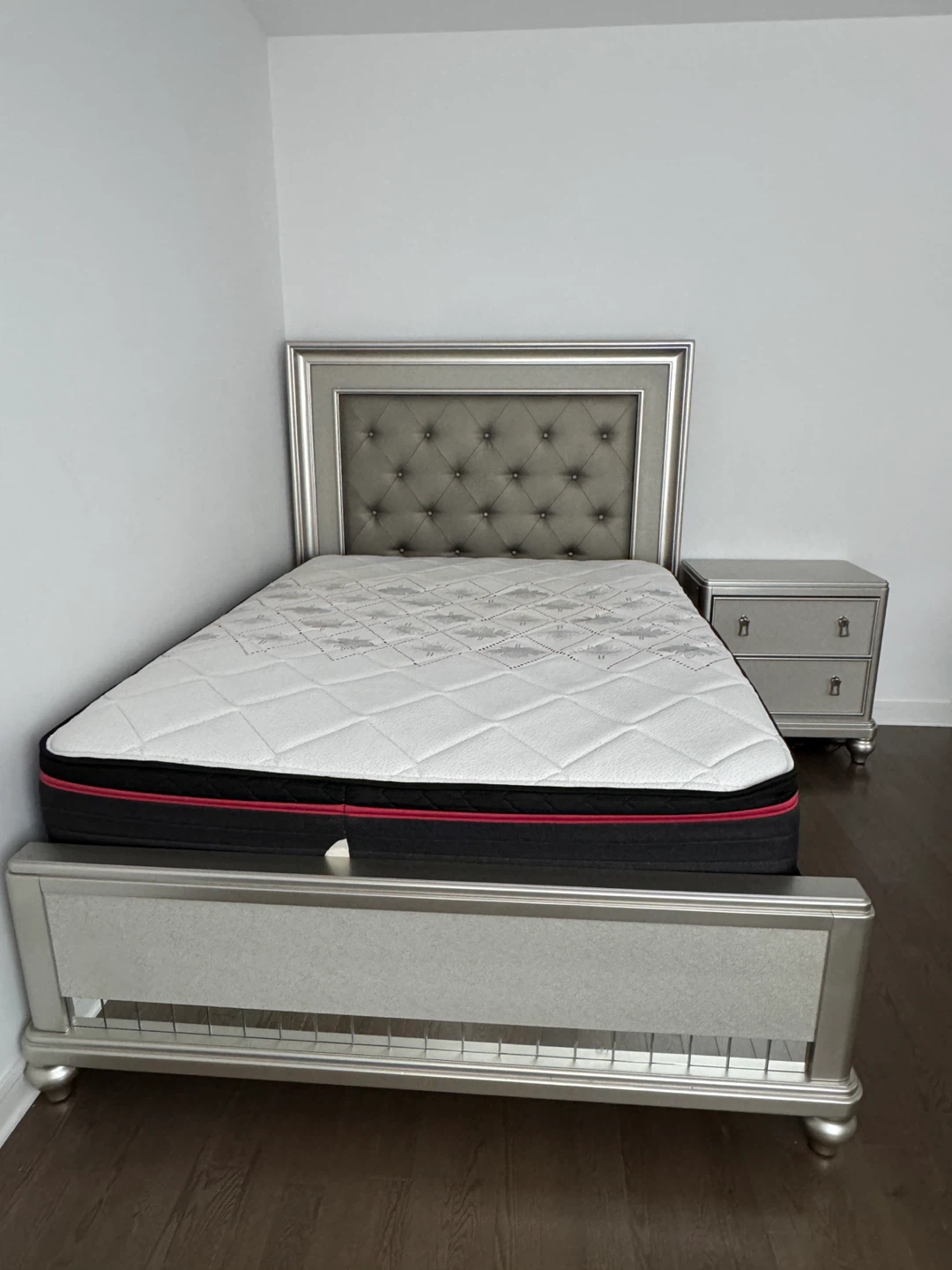 Silver tufted bed frame with matching nightstand