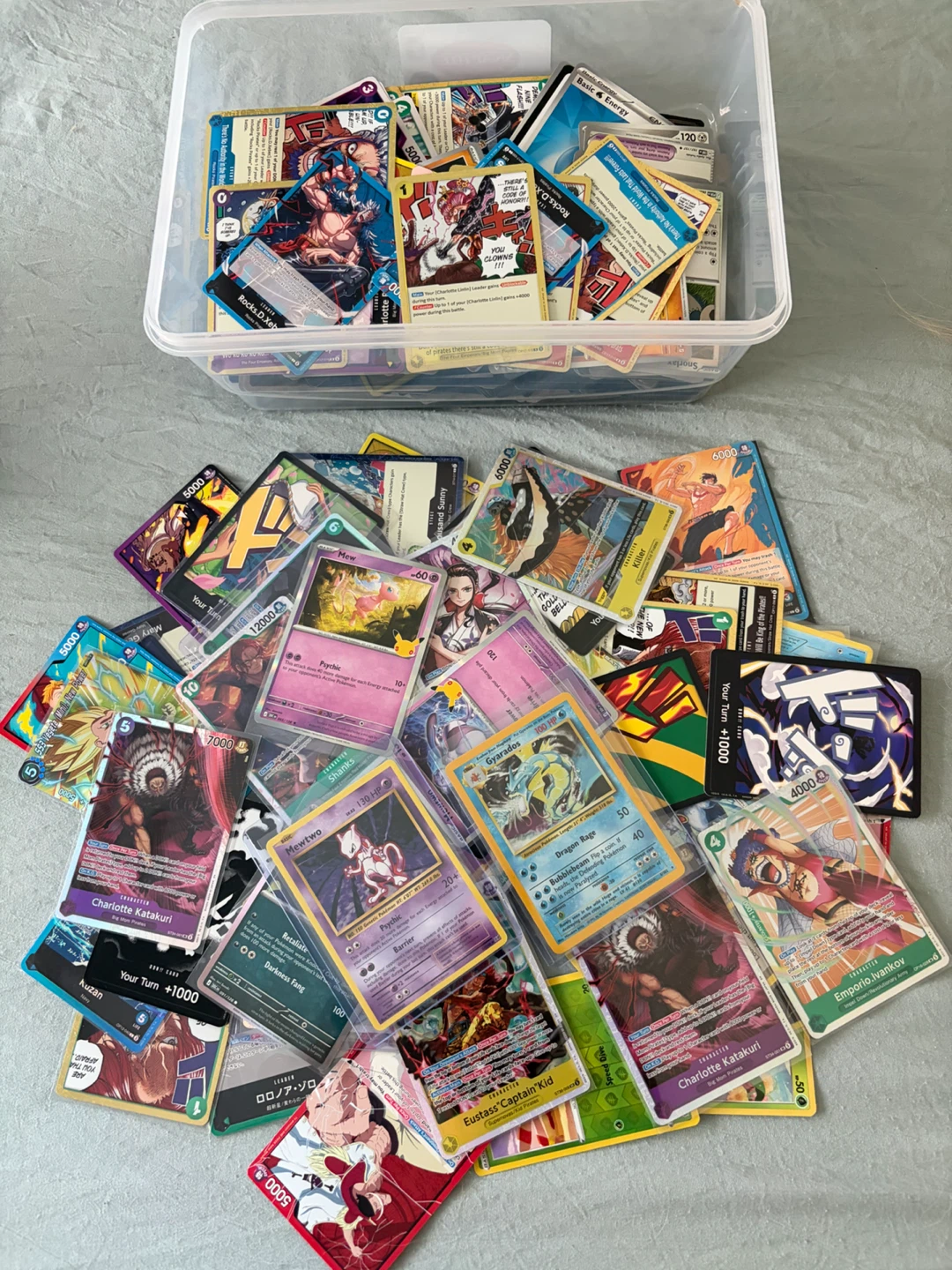 Assorted Trading Card Collection in Storage Bin