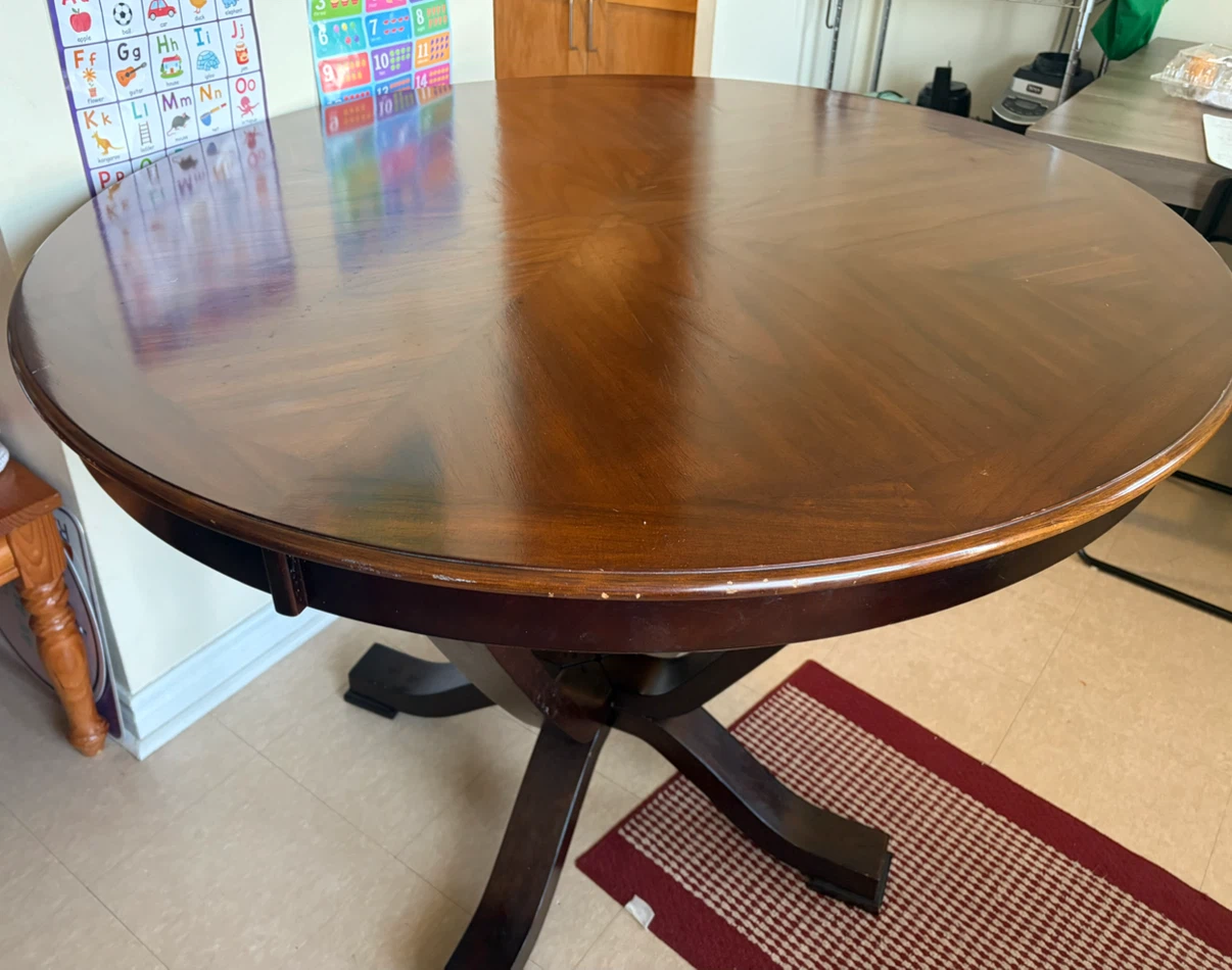 Round wooden dining table