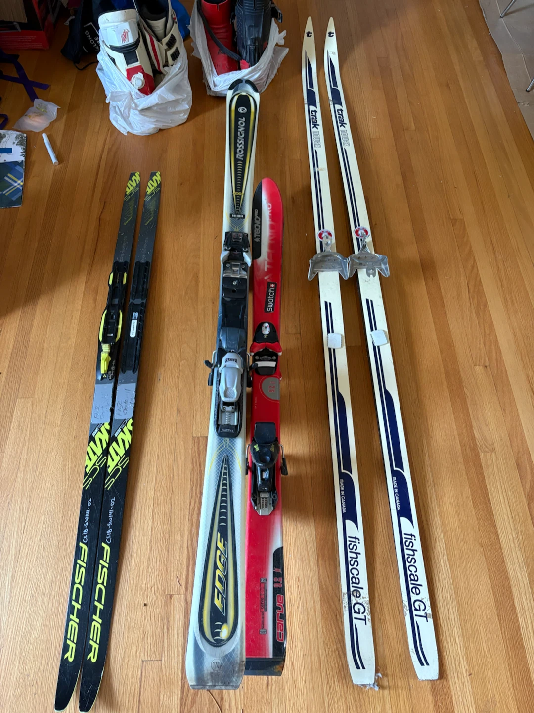skis and two pairs of boots