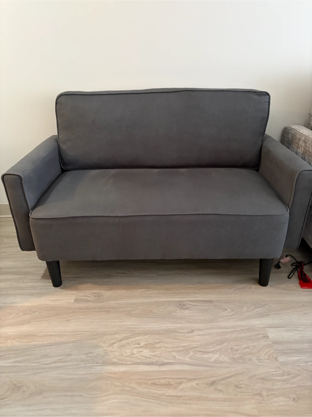 Dark grey loveseat