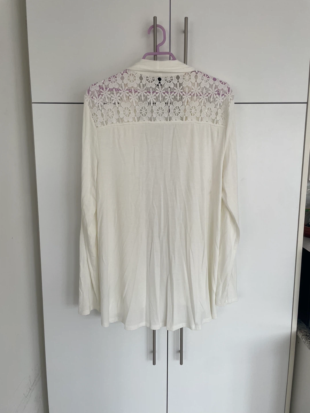 Rear view White lace trim cardigan