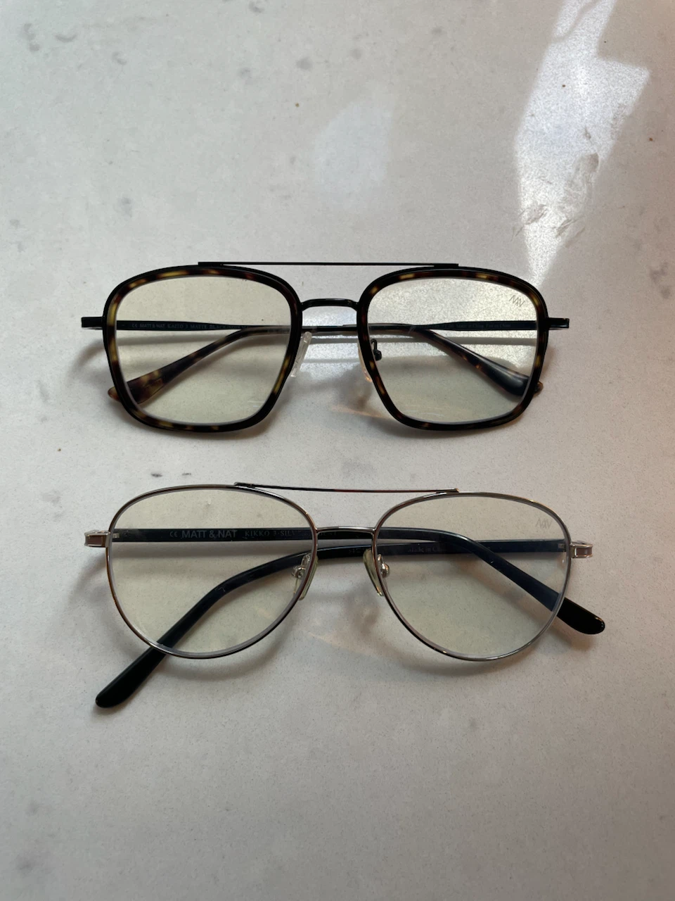Two pairs of Matt & Nat glasses