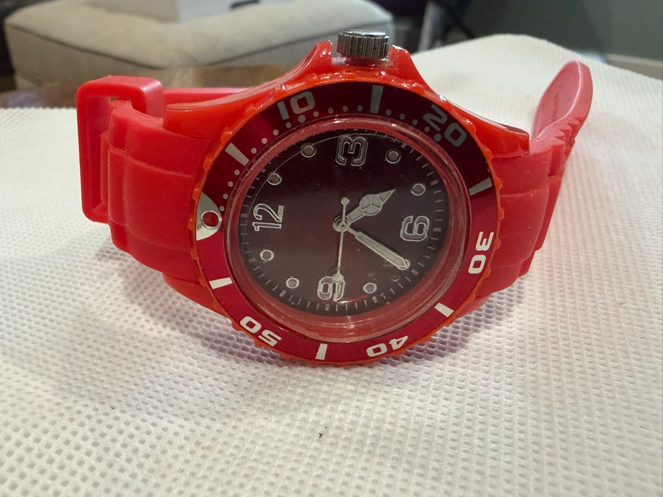 Red analog wristwatch