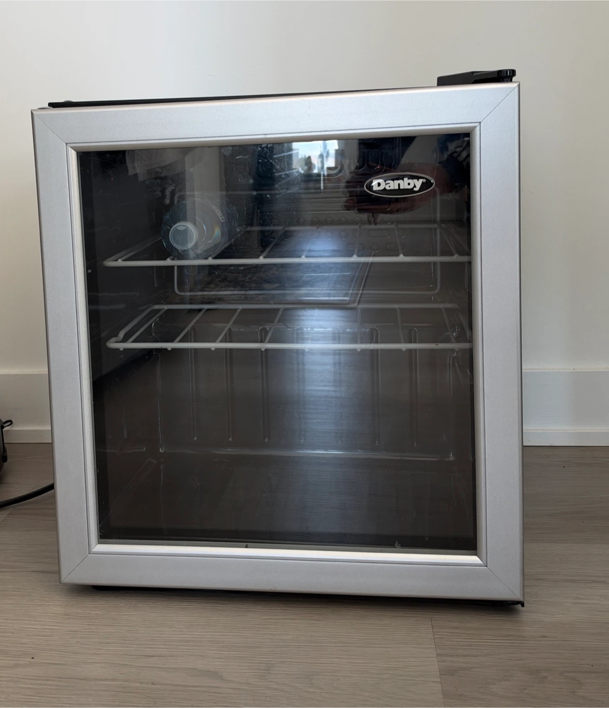 Danby Beverage Mini Fridge Condition: Good, clean interior.