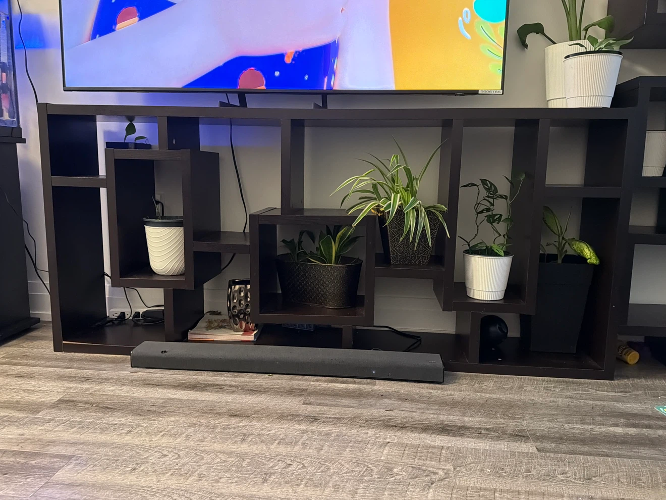 Modern dark brown asymmetrical shelving unit