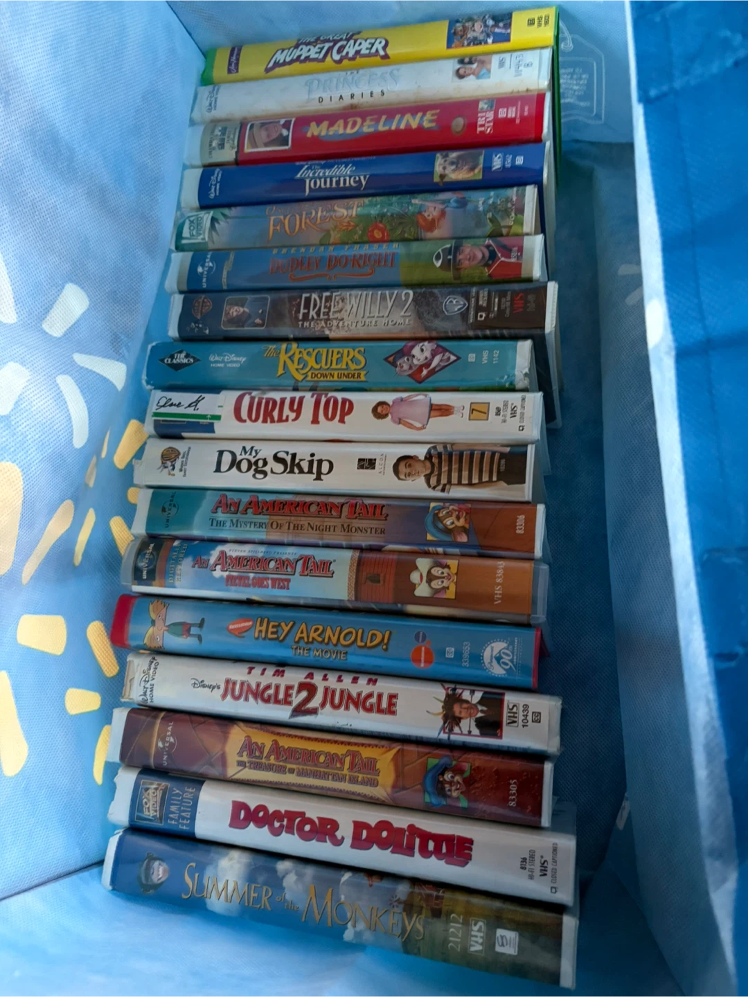 Large collection of assorted DVDs and VHS tapes