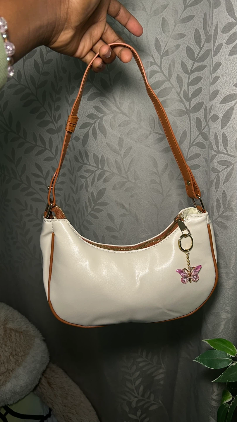 Cream and tan small shoulder bag