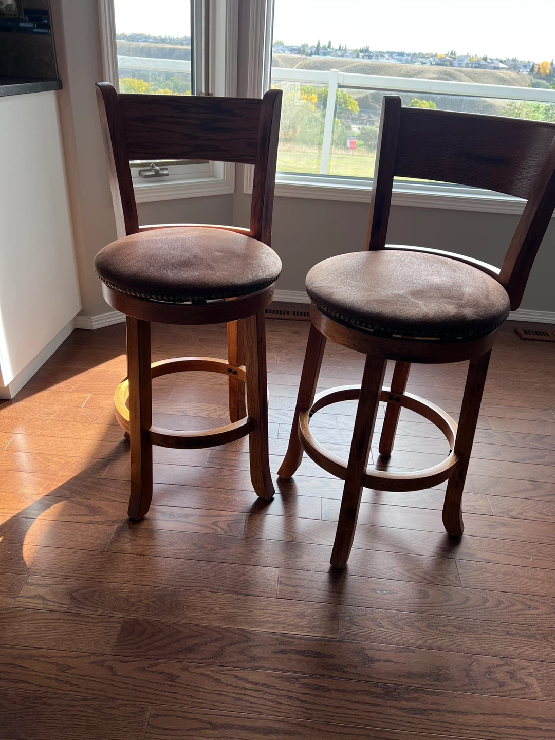 Set of Two Oak Swivel Bar Stools
