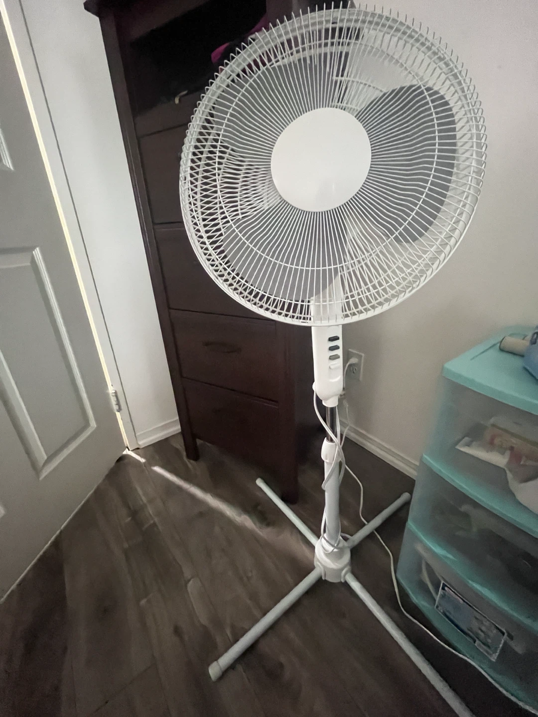 White pedestal standing fan