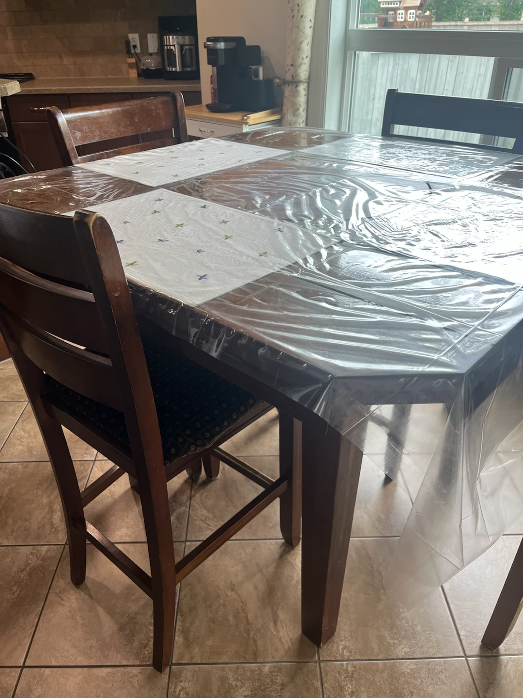 Wooden dining table with 4 chairs