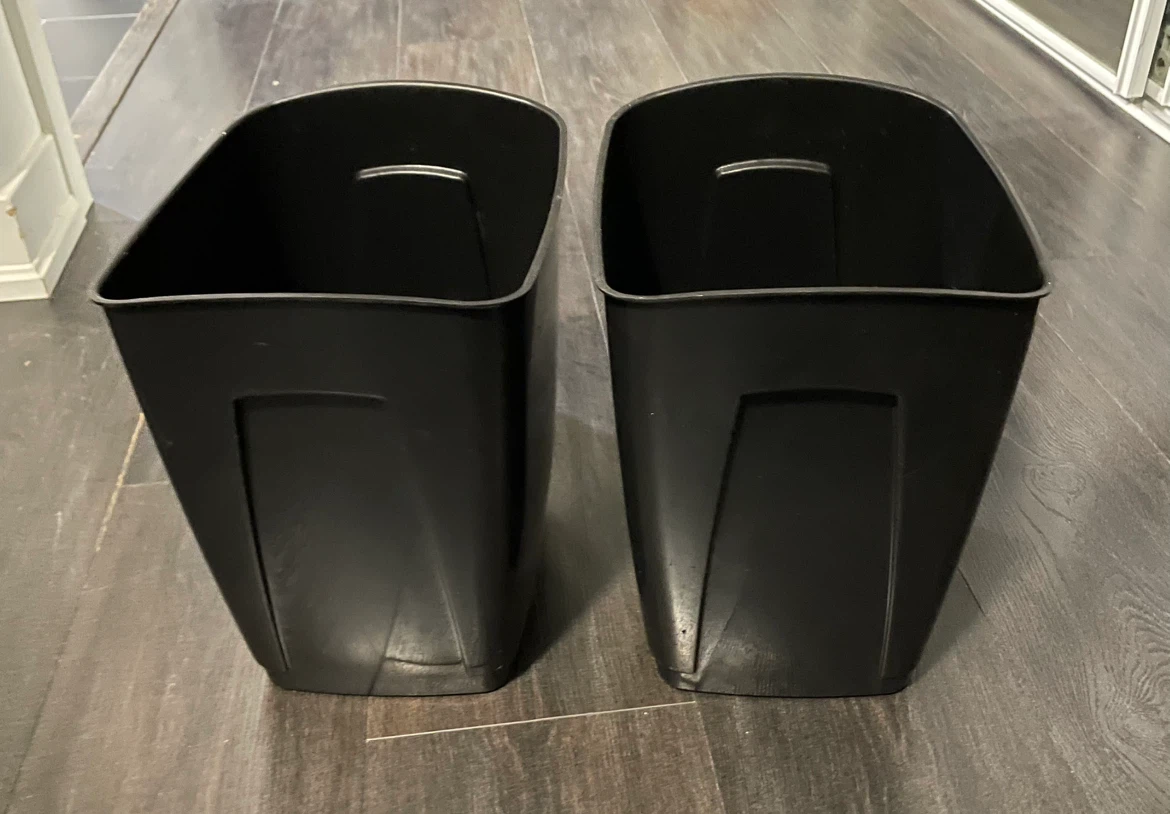 Two Black Plastic Waste Baskets