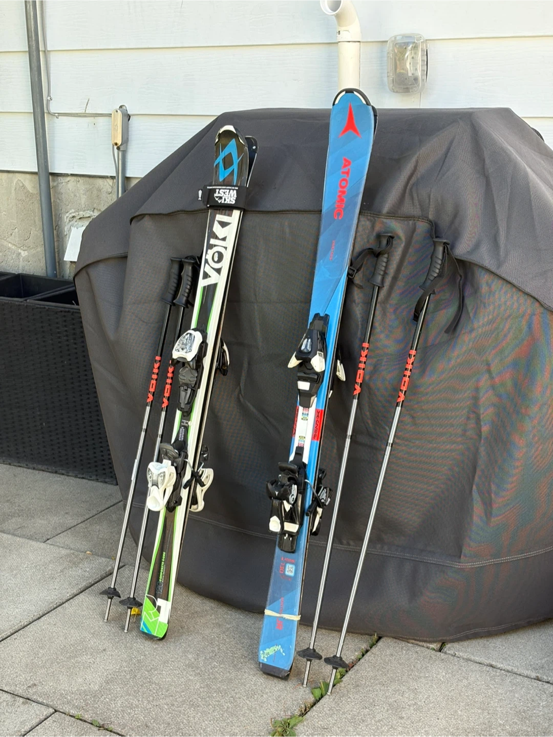 Volkl and Atomic Kids Skis with Poles - photo 2