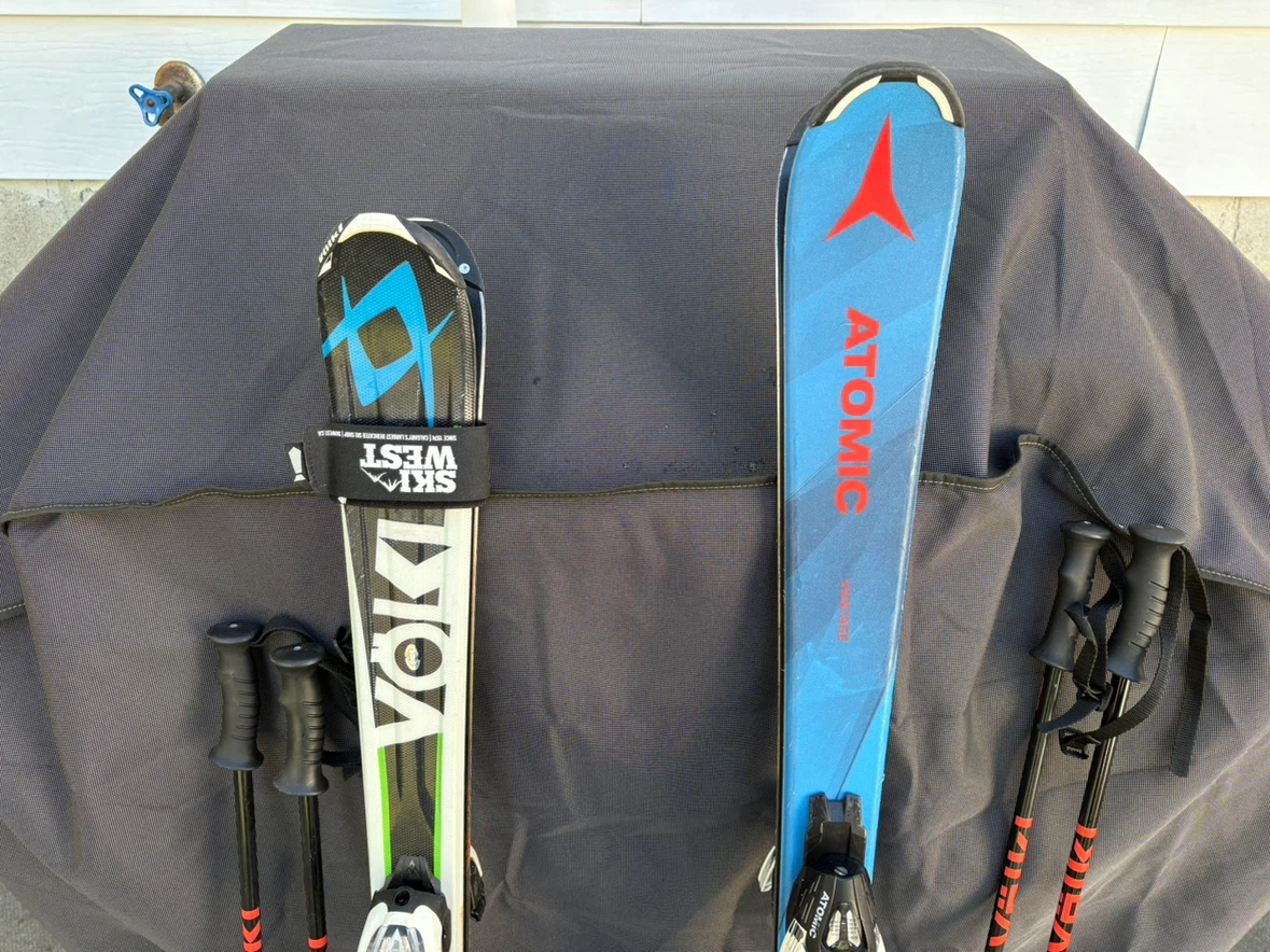 Volkl and Atomic Kids Skis with Poles - photo 3