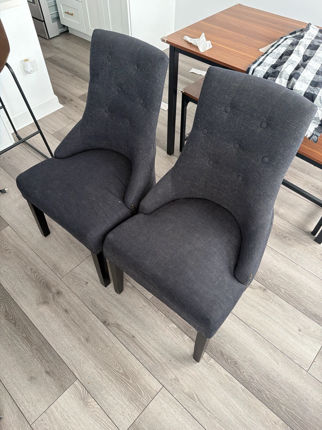 Two Dark Gray Upholstered Dining Chairs