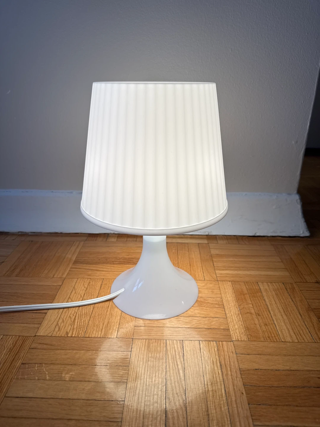 white table lamp with bulb