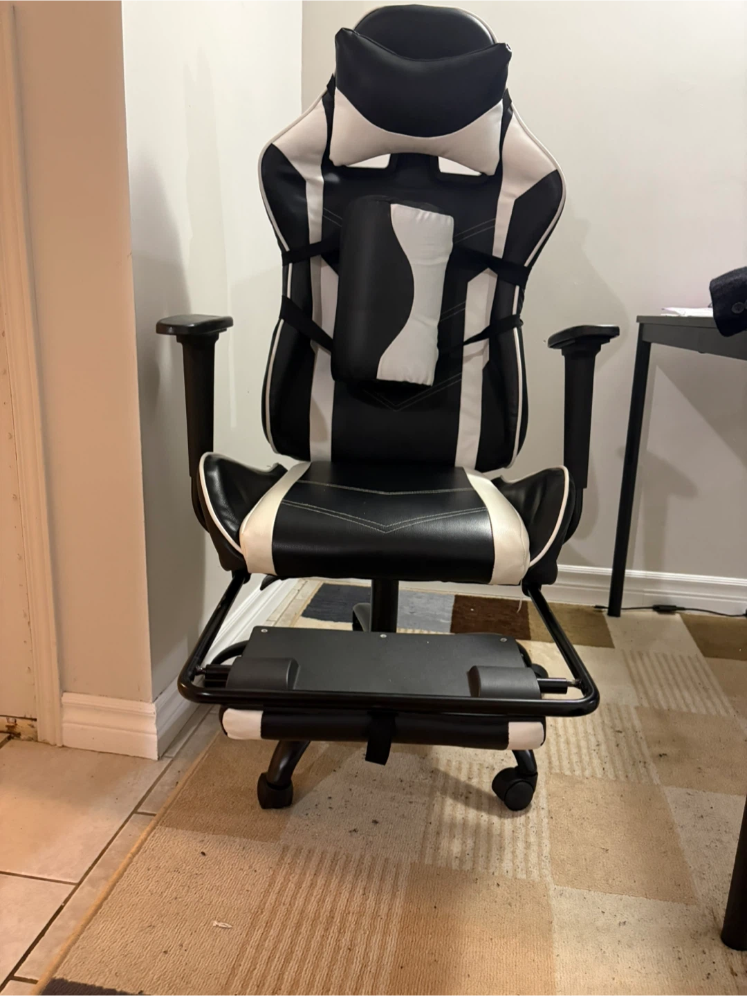 Black and white gaming chair with footrest - photo 3