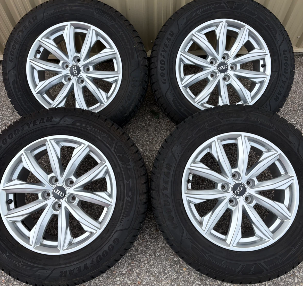 4 x 235/65/17 GOODYEAR WINTER TIRES AND OEM AUDI RIMS $1450
