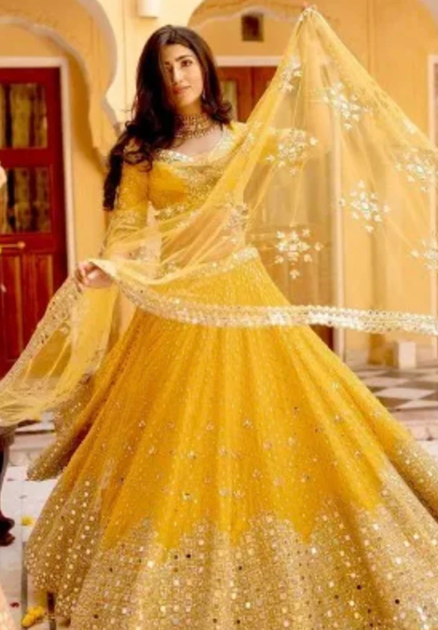 Yellow Lehenga Choli with Mirror Work