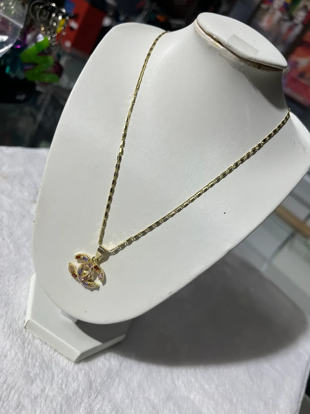 Gold-tone heart and Chanel-style logo pendant necklace - photo 3