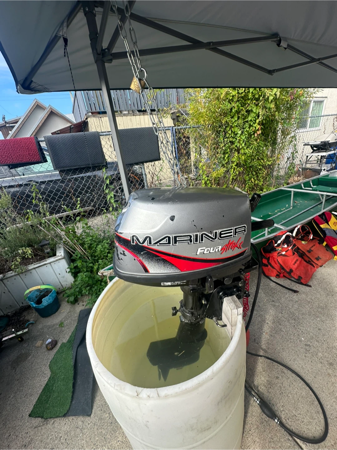 Canoe with Mariner Outboard Motor + extra accessories