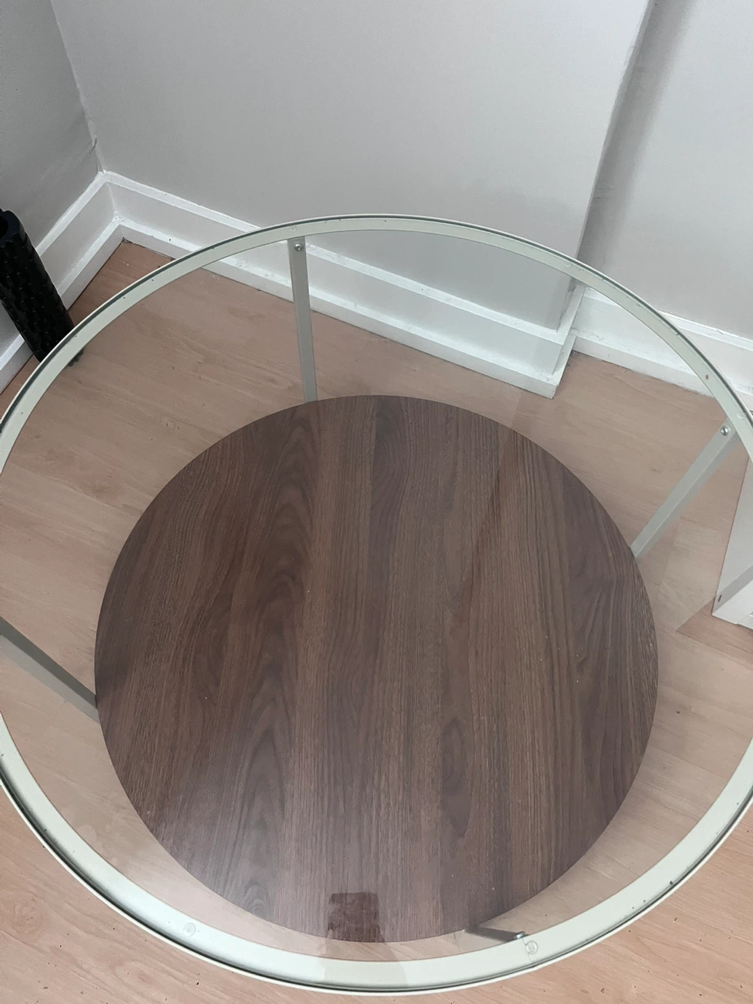 Round glass coffee table with wood shelf