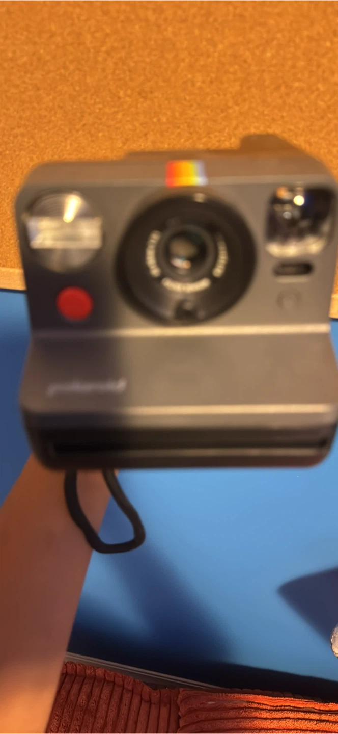 Polaroid camera with 2 packs of i-Type film been collecting dust